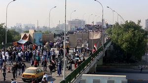 أكثر من 20 محتجا أصيبوا بتفريق الأمن للمحتجين على جسر الأحرار ببغداد- جيتي
