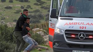قالت وزيرة الصحة الفلسطينية إن العالم شاهد بالصوت والصورة على اعتداء جنود الاحتلال- جيتي