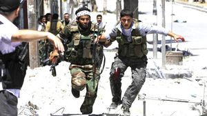 مقاتلون من المعارضة السورية في حمص - ا ف ب - أرشيفية