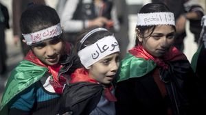 فعالية لأطفال قطاع غزة تضامناً مع مخيم اليرموك في سوريا - أ ف ب