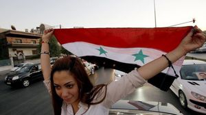 مؤيدة للأسد خلال احدى التظاهرات في عمان - (ارشيفية)