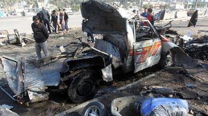 أحد التفجيرات السابقة، واستهدف سيارة في بغداد - أ ف ب