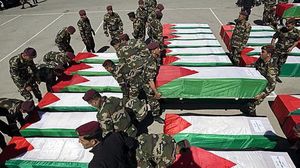 تسليم جثامين مقاتلين فلسطينيين للسلطة - ا ف ب - أرشيفية