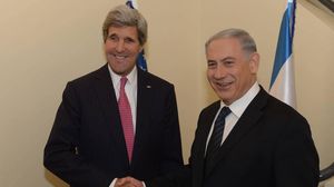 وزير الخارجية الامريكية كيري ورئيس الوزراء الاسرائيلي نتنياهو - ا ف ب