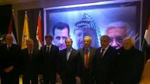 علقت أثناء الاحتفالية صورة كبيرة لرئيس السلطة بجانب بشار الأسد - صفا