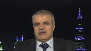 العميد أسعد الزعبي هو رئيس الوفد السوري المعارض في "جنيف3" - الجزيرة
