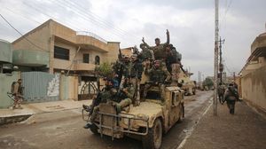 القوات العراقية بعد سيطرتها على شرق الموصل- أ ف ب 