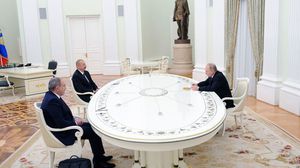 بوتين سيجري لقاءات جانبية بعد القمة الثلاثية- جيتي