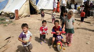 اطفال سوريون لاجئون - ا ف ب 