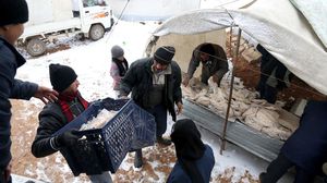 النازحون السوريون يقاسون نتيجة العاصفة الاخيرة - الاناضول