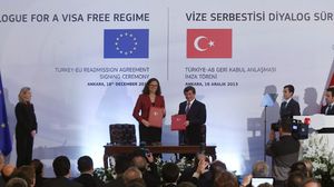 توقيع الإتقاق بين تركيا والإتحاد الأوروبي 16/12/2013 - أ ف ب