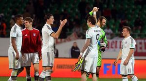 لاعبو بايرن ميونيخ يحتفلون بالتأهل الى نهائي مونديال الاندية في اغادير في- ا ف ب
