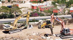 اسرائيل تقوم بتحويل الأراضي الزراعية إلى أراض سكنية للمستوطنين - ا ف ب