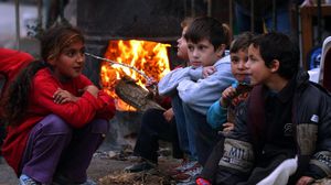 أطفال سوريون في مخيم اليرموك - ا ف ب