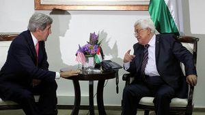 محمود عباس وجون كيري في رام الله - الأناضول