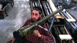 سيطر مقاتلو الجبهة على مقار تابعة لهيئة الأركان في الجيش السوري الحر - ا ف ب
