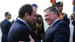يشير محللون إلى وجود تنسيق أردني مصري بخصوص زيارة الملك الأخيرة للقاهرة - أ ف ب