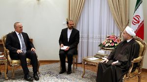لقاء روحاني بجاويش أوغلو في طهران - الأناضول