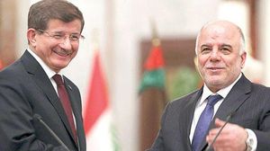 رئيس الحكومة العراقية العبادي ورئيس الحكومة التركية أوغلو - أرشيفية