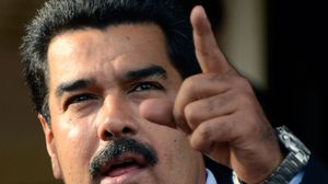 الرئيس الفنزويلي نيكولاس مادورو يسعى لإيقاف انخفاض أسعار النفط عالميا - أ ف ب