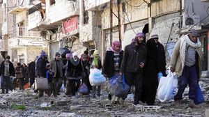 إجلاء المدنيين من حمص في سوريا بعد حصار طويل - أ ف ب