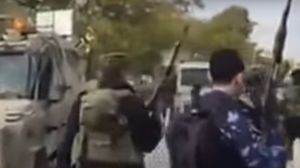  أفراد الأمن الوطني يشهرون أسلحتهم في وجه آليات عسكرية إسرائيلية- يوتيوب 