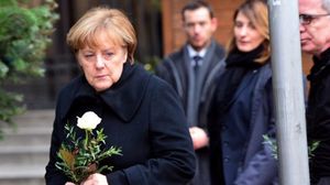 المستشارة الالمانية أنجيلا ميركل خلال مشاركتها في مراسم عزاء قتلى هجوم برلين- أ ف ب 