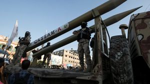 عرض عسكري سابق لكتائب القسام في قطاع غزة كشفت فيه عن صاروخ جديد- أ ف ب
