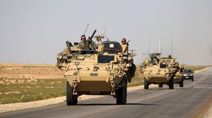 القوات الأمريكية تتجول في أحياء من الفلوجة برفقة القوات العراقية- جيتي
