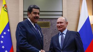 بوتين يدين أي محاولة لتغيير الوضع بالقوة في فنزويلا- جيتي 