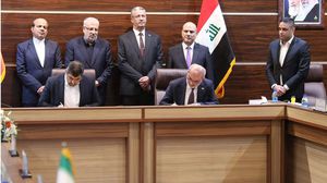 أثناء توقيع اتفاقيات مشتركة بين البلدين بحضور وزيري نفط العراق وإيران- وزارة النفط العراقية 