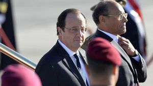 الرئيس التونسي في استقبال الرئيس الفرنسي – أ ف ب