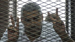 صحفي الجزيرة محمد فهمي يتخلى عن جنسيته المصرية لينال حريته - أ ف ب