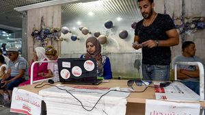 لجنة تسجيل ناخبين في الانتخابات التونسية- أرشيفية (جيتي)