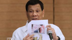 الرئيس الفلبيني استعرض صورا قال إنها إثباتات على تعرض عاملات للتعذيب- جيتي 