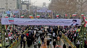  قال روحاني إن "وجود الشعب اليوم في كل شوارع جمهورية إيران الإسلامية (...) يعني أن العدو لن يحقق أبدا أهدافه- جيتي 