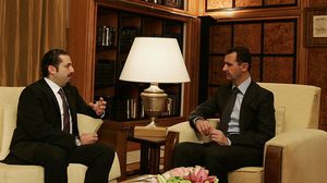 عن إمكانية مصافحة الأسد مجددا، أجاب الحريري: "لا. مستحيل"- جيتي