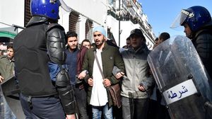 انتشرت دعوات عبر مواقع التواصل في الجزائر تدعو للتظاهر اليوم الجمعة ضد ترشح بوتفليقة- جيتي (أرشيفية)
