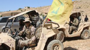 عناصر من حزب الله اللبناني خلال مشاركتهم في الحرب بسوريا- جيتي