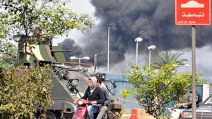تصاعد الدخان إثر تجدد القتال بين جبل محسن وباب التبانة في طرابلس - أ ف ب