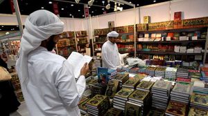 زوار في معرض أبو ظبي الدولي للكتاب في 2011 - أ ف ب