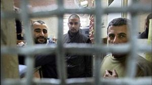 أسرى فلسطينيون في سجون الاحتلال - ا ف ب