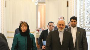  وزير خارجية إيران محمد ظريف ووزيرة خارجية الاتحاد الأوروبي كاثرين آشتون - أرشيفية