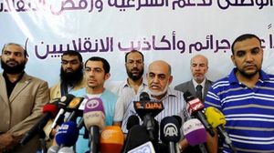 قيادات في تحالف الشرعية الداعم لمرسي - ا ف ب