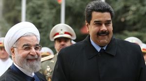 الرئيس الإيراني حسن روحاني ونظيره الفنزويلي نيكولاس مادورو - أرشيفية