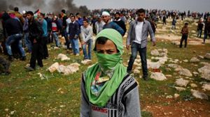 شبان فلسطينيون في مواجهات مع الاحتلال الإسرائيلي (أرشيفية)- أ ف ب