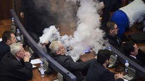نواب قوميون قاموا بإلقاء قنابل غاز لمنع التصويت على اتفاق لترسيم الحدود مع الجبل الأسود- جيتي 