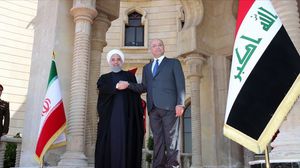 توقيع الاتفاقيات جاء على هامش زيارة يقوم بها روحاني إلى بغداد- الأناضول