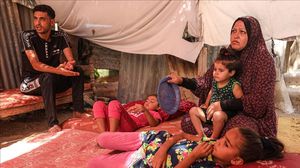 تستمر معاناة الأهالي في غزة في ظل عدم دخول المساعدات والعدوان- الأناضول