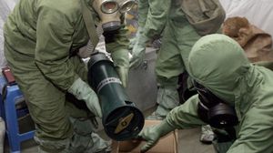 من عمليات التخلص من الأسلحة الكيماوية السورية - ا ف ب